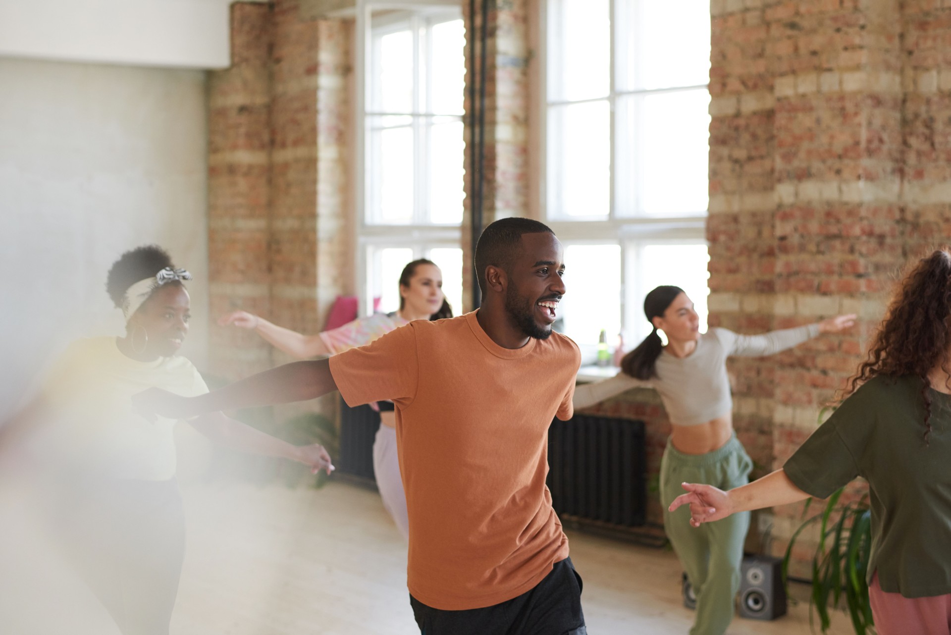 Man dancing with group