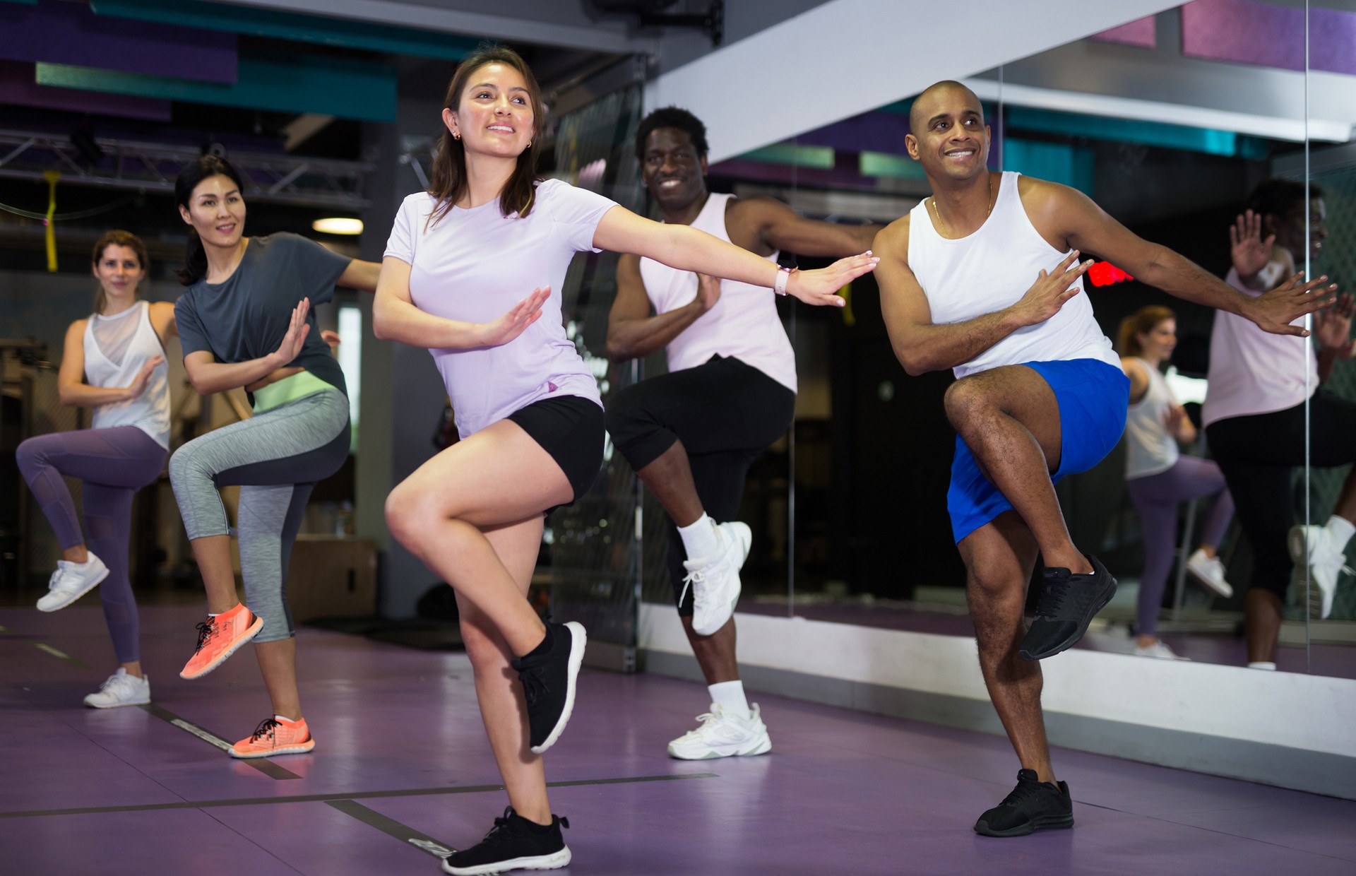 Young adult people training in dance studio